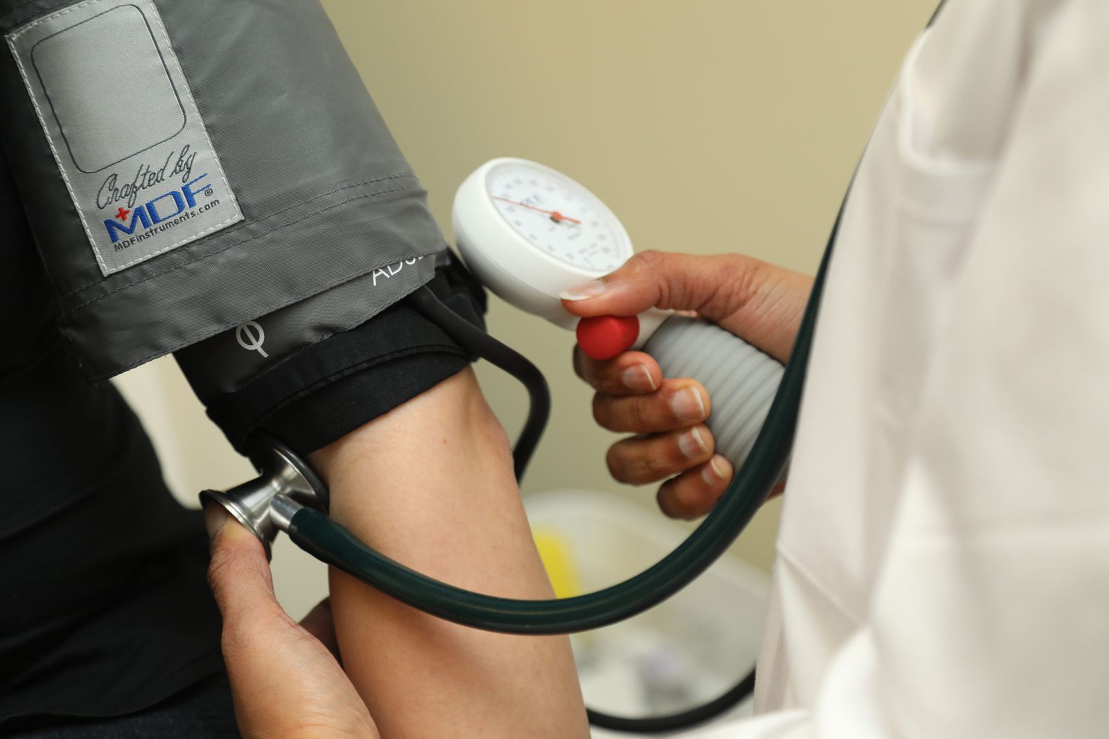 Close-up of a blood pressure check at Care4Me Clinics
